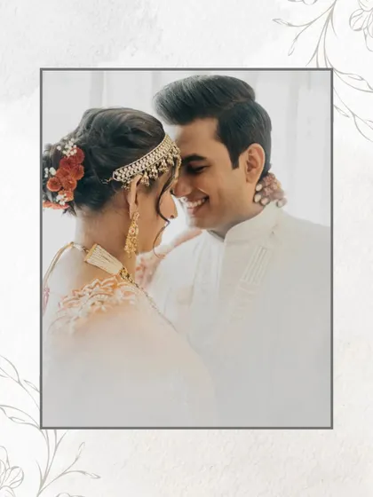 A close-up shot capturing the gentle intimacy between the couple. The soft focus and warm lighting highlight their connection, making it a perfect example of a romantic and candid wedding portrait.