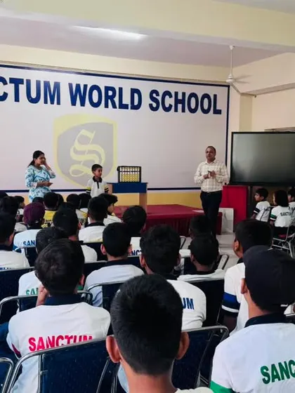 A wide shot of the presentation at Sanctum World School. We provide the presentation materials and training to help you conduct effective seminars.