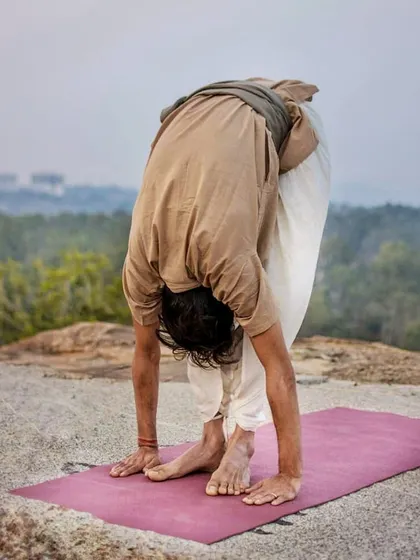 A simple forward bend on a clifftop. My only regret about yoga is that I did not start earlier in my life.