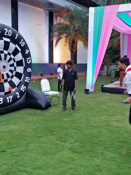 Our Giant Inflatable Dartboard is a safe and fun game for outdoor events. Players throw sticky, velcro-covered balls to score points, making it a great competitive game for parties.