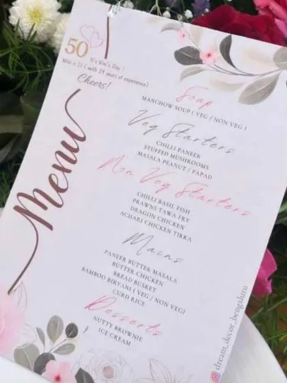 A beautifully designed menu for a 50th-anniversary lunch. Coordinating your stationery with the decor adds a sophisticated and cohesive touch to the event.