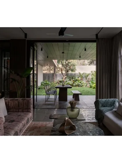 The full view from the living room out to the garden at Pràna. This perspective shows how we design spaces to maximize views and natural light, creating a serene and calming environment.