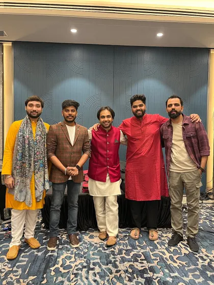 A post-show picture with my bandmates. The camaraderie and friendship we share off-stage is a huge part of our chemistry on-stage.