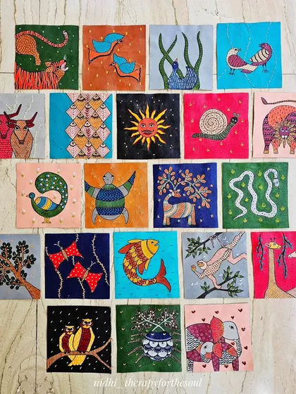 Another arrangement of the Gond art tiles, showing the variety of subjects from tigers and elephants to fish and birds. This was a collaborative project with my mother, who added the beautiful embroidery.
