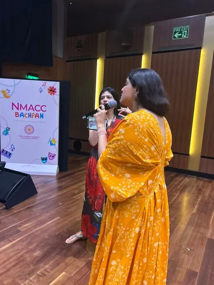 We love performing for and with our students. Here we are on stage at the NMACC Bachpan festival, sharing the joy of Indian folk music.