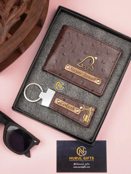 This brown dotted-texture wallet and keychain set is personalized with names and charms, making it a unique and thoughtful gift.