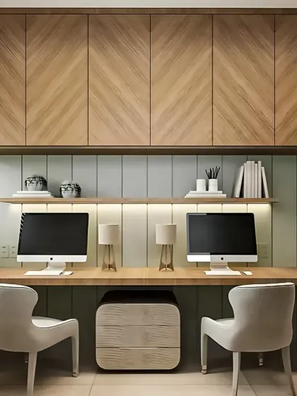 A well-designed home office can significantly boost productivity. We created this dual-workstation setup with a floating desk, overhead cabinets for storage, and subtle backlighting to provide a comfortable and organized workspace for two.
