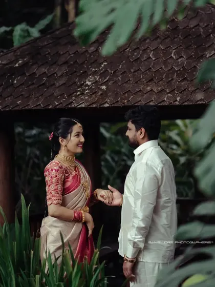 A series of photos from a post-wedding shoot in a lush, tropical garden. The couple's traditional attire looks stunning against the vibrant greenery.