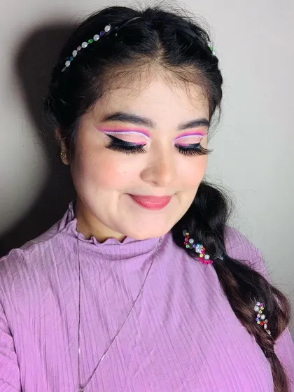 Another view of the purple angel look, showing the details in the hair and makeup.