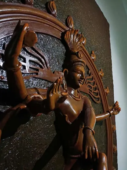 Another detailed shot of the Natraj sculpture, showing the dynamic pose and the fine craftsmanship of the hands and limbs.