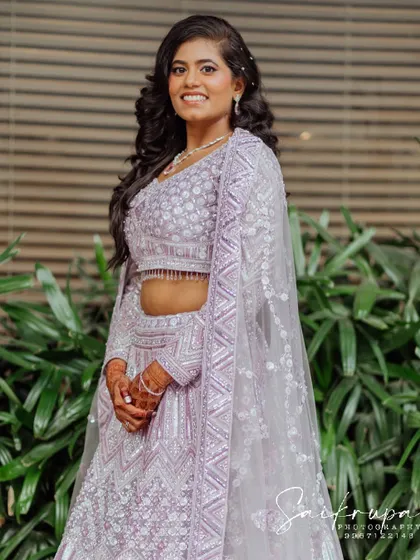 A lovely, welcoming portrait of the bride smiling directly at the camera. While I love candids, I also make sure to capture these beautiful, classic shots.