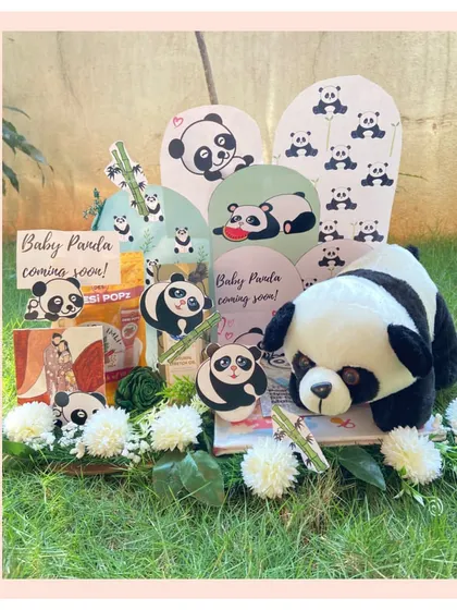 A "pandastic" surprise for the parents-to-be. This adorable panda-themed hamper is filled with goodies to pamper expecting parents as they await their little one.