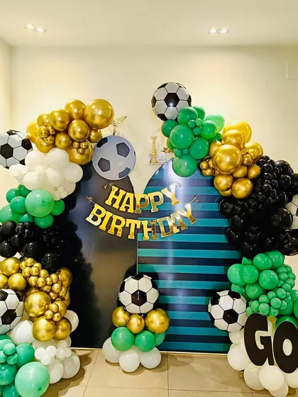 A detailed view of the balloon arrangement, showing the mix of colors and sizes that create a professional look.