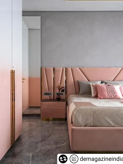 For this daughter's bedroom, we used a soft pink palette with an ombre effect on the wardrobes. The upholstered bed and headboard with geometric details add a touch of playful sophistication, creating a room that is both royal and youthful.