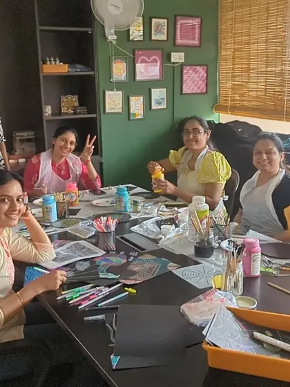 A group of participants enjoying a Zentangle and doodling session in our cozy green corner.
