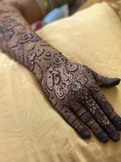 This is a detailed view of my intricate bridal henna work. Each design is unique, combining traditional patterns like paisleys and mandalas with fine-line fillers to create a stunning, full-coverage look for your special day.