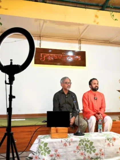 A behind-the-scenes look at our Yoga Vichara talk. We use a simple setup to stream these enlightening sessions, making this knowledge accessible to a global audience online.