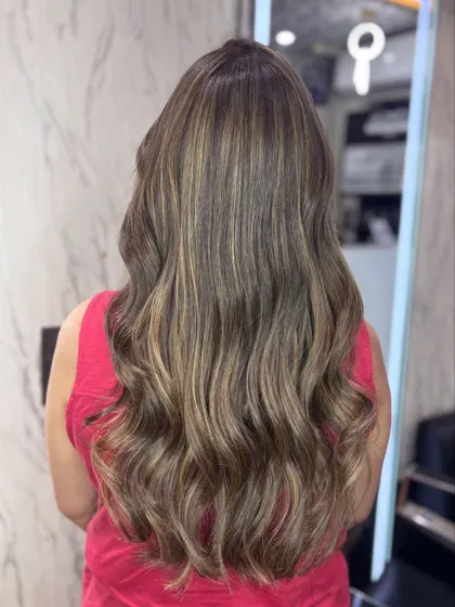 The back view of this Beige Biscoff hair. The color is a beautiful neutral blonde that looks incredibly chic.