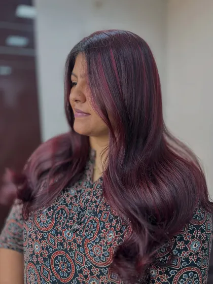 A beautiful cherry blossom red. This color is rich and dimensional, with soft waves that make the tones pop.