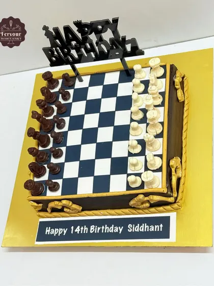 A different angle of the chess cake, highlighting the glossy finish on the board and the craftsmanship of the chocolate pieces.