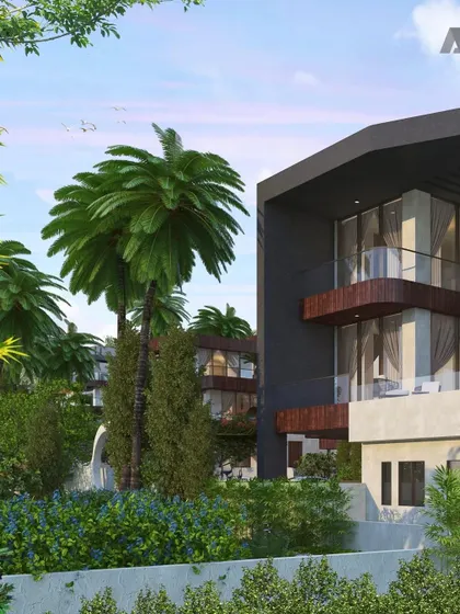 The entrance to one of the luxury villas at Evara. The design incorporates lush landscaping and a contemporary aesthetic to create a sense of sophisticated living amidst nature.