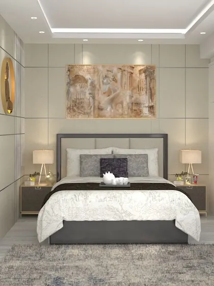 A luxurious bedroom featuring a textured rug, elegant bedside lamps, and a large piece of abstract art, all contributing to a feeling of refined comfort.