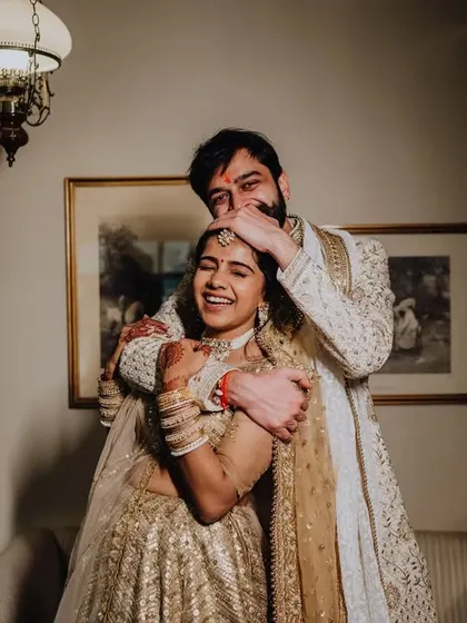A playful and loving embrace, capturing the fun and affection in their relationship.