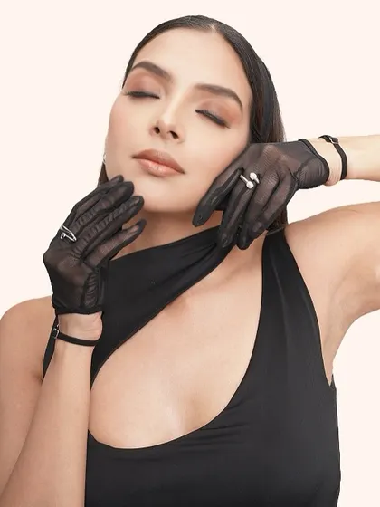 This image captures the soft, dreamy quality of the makeup, with closed eyes highlighting the blended eyeshadow.