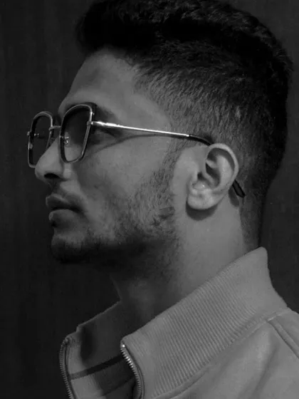 A simple, black and white profile shot. Sometimes a quiet moment is just as important as a loud performance.