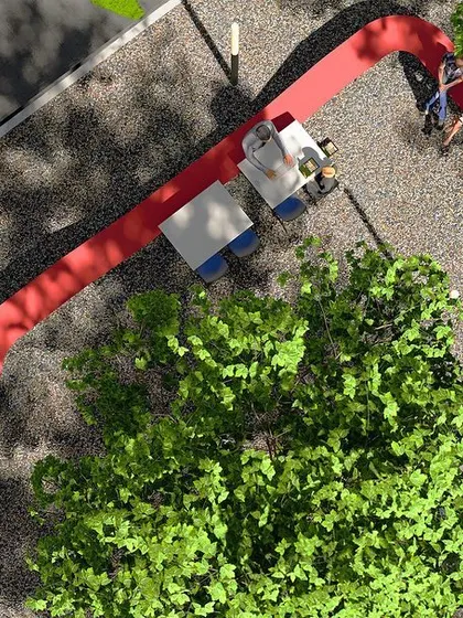 An aerial rendering of our concept for sculptural seating in a tech campus. The red ribbon element is designed to maximize seating while creating a playful, artistic form that winds through the trees, facilitating dining, working, and interaction.