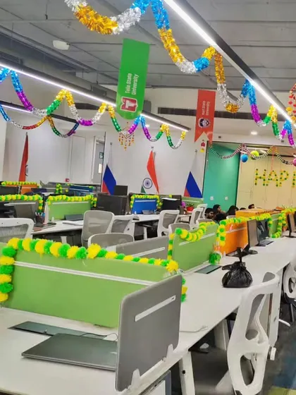 The festive spirit should be everywhere. I decorated the entire workstation area with colorful streamers and flower garlands to keep the office vibe cheerful.