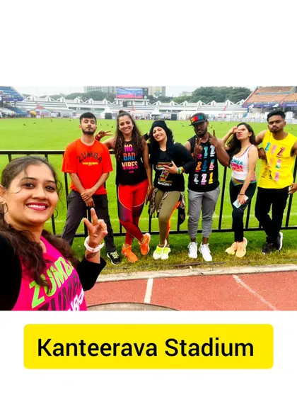 A team selfie on the track at Kanteerava Stadium. We are a family of trainers dedicated to spreading the love of dance and fitness.