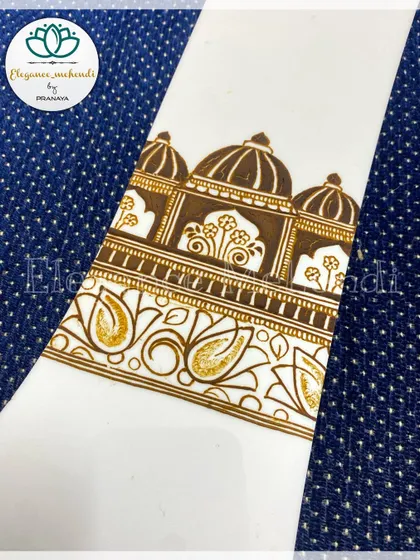 An elegant startup design on a practice sheet, showing an architectural band with floral details.