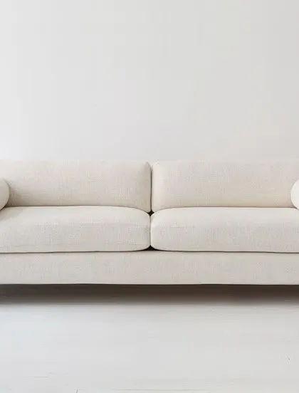 Designed to work equally well in a formal living room or a cozy media room, the Hogward sofa is built for relaxation. Its plush cushions provide ultimate comfort, while its precise proportions and sculptural details make it a statuesque anchor for any room.