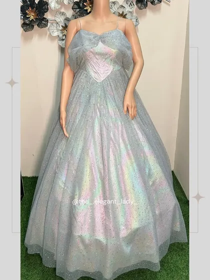 A full-length view of the iridescent Cinderella gown, perfect for showing its magical, shimmering quality.