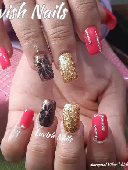 A festive and bold design combining bright red, gold glitter, and black spiderweb art, with crystal accents for extra dimension.