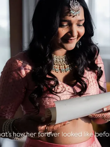 In that moment, reading his words, she knew exactly what her forever looked like before it even began. A beautiful, candid shot of a bride lost in a moment of love.