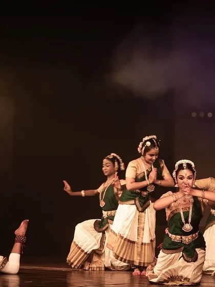 A dynamic scene with multiple dancers creating a rich visual story.