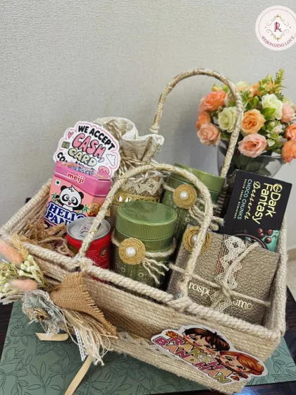 This jute hamper is filled with a mix of sweet and savory treats, along with decorated jars. It's a perfect way to send a bundle of happiness to your sibling.