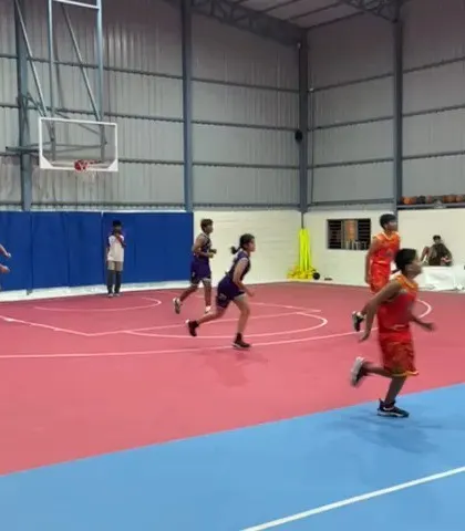 An action shot from the Youth Basketball League Season 1 finals, a glimpse into the history and competitive spirit of our academy.