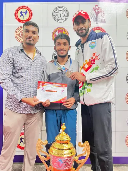 Proud moment with one of our junior fighters after he secured a medal at the state level kickboxing tournament. The future of our gym is strong.
