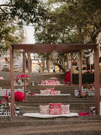 A full view of the unique tiered seating arrangement, creating a visually stunning and memorable lounge space for the Mehfil-e-Mehendi.