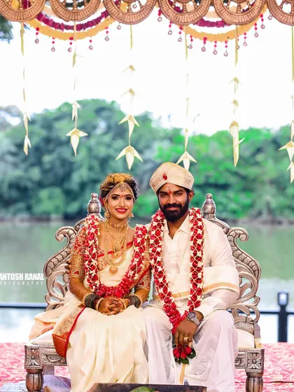 An elegant portrait of the happy couple during their traditional wedding ceremony.