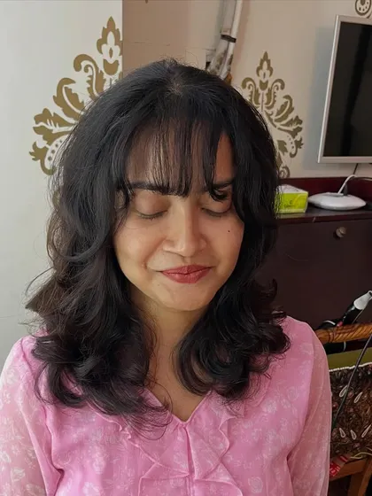 A soft and flattering look for medium-length hair.