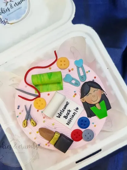 This custom bento cake was for a fashion designer. I included tiny, handmade fondant details like scissors, buttons, fabric, and even a lipstick to match her vibe.
