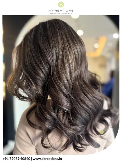 Another angle of our ash brown highlights, showcasing the beautiful dimension and cool, modern tones from a side profile.