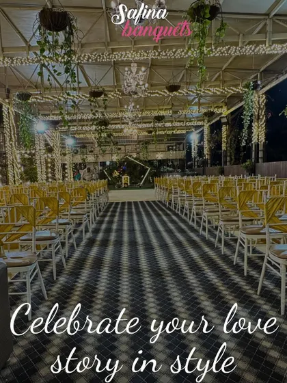 A nighttime view of the Sky Terrace, set up with a checkered aisle runner and elegant seating, perfect for celebrating your love story in style.