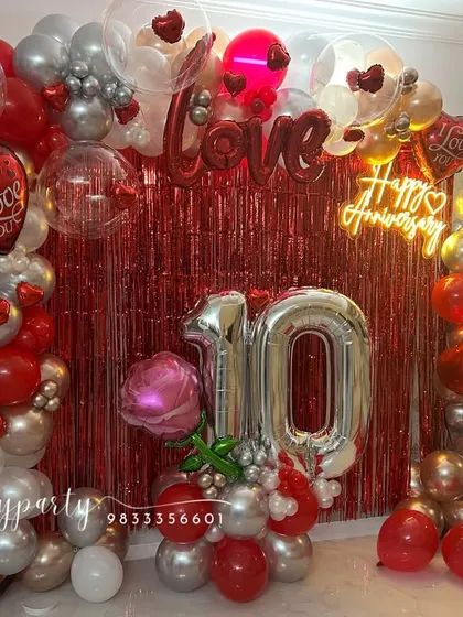 The complete anniversary decoration setup, perfect for creating a festive and romantic photo corner in your home.