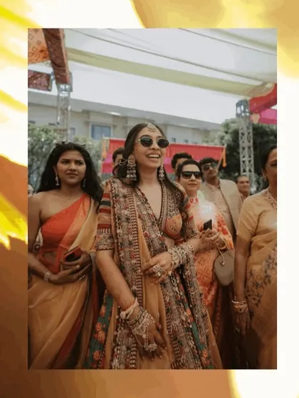 The bride's stylish entry at her Haldi ceremony, capturing her confidence and the vibrant atmosphere.