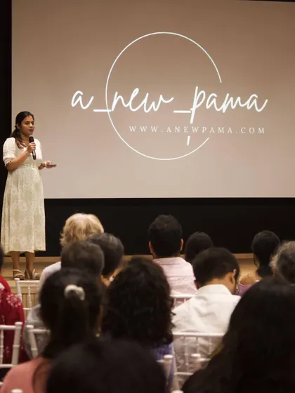 Speaking on stage at 'Weaving Dreams' in Mumbai, the event where I had my first exhibition. I shared the story of my journey as an artist and the meaning behind my work. It was a powerful moment to share my voice with a larger audience.